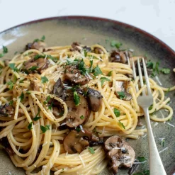 Lagoa Dinner Plate 27cm 11 Lagoa Dinner Plate 27cm -Kitchen Supplie Shop lifestyle 0027 dried mushroom spaghetti lagoa close up 31ff7378 a5c1 4a1a a017 9ead42bb24f3